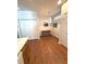 Cozy dining area with natural lighting, table and laminate flooring at 317 Glens Way, Woodstock, GA 30188