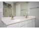 Bathroom with a double sink vanity, neutral walls, and modern fixtures at 402 Iona Abbey Se Ct, Smyrna, GA 30082