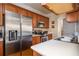 Well-equipped kitchen featuring stainless steel appliances and ample wooden cabinetry at 402 Iona Abbey Se Ct, Smyrna, GA 30082