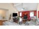 Vaulted living room with hardwood floors, a fireplace, and natural light at 7881 Wilkerson Ln, Palmetto, GA 30268