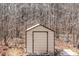 Tan metal utility shed with single door at 7881 Wilkerson Ln, Palmetto, GA 30268