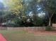 Large backyard has privacy fence and mature shade trees at 1919 Barrett Knoll Nw Cir, Kennesaw, GA 30152