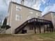 View of the home's backyard and large deck at 1919 Barrett Knoll Nw Cir, Kennesaw, GA 30152
