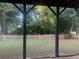 Covered patio shows the spacious backyard with a wooden fence at 1919 Barrett Knoll Nw Cir, Kennesaw, GA 30152