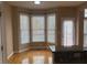 Bright breakfast nook with hardwood floors and large bay windows at 1919 Barrett Knoll Nw Cir, Kennesaw, GA 30152