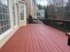 Large wooden deck with railings overlooking backyard, ideal for outdoor entertaining at 1919 Barrett Knoll Nw Cir, Kennesaw, GA 30152