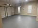 Spacious garage with two doors and epoxy flooring at 1919 Barrett Knoll Nw Cir, Kennesaw, GA 30152