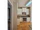 Bright kitchen features white cabinets, stainless steel appliances, and granite countertops at 1919 Barrett Knoll Nw Cir, Kennesaw, GA 30152
