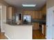 Bright kitchen with stainless steel appliances and granite countertops at 1919 Barrett Knoll Nw Cir, Kennesaw, GA 30152