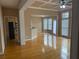 Spacious living room featuring hardwood floors, bright breakfast nook and kitchen at 1919 Barrett Knoll Nw Cir, Kennesaw, GA 30152
