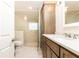 Clean bathroom with a glass shower, a granite vanity, and a white door at 2740 Margaret Mitchell Nw Dr, Atlanta, GA 30327