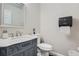 Powder room features updated fixtures and elegant vanity at 3370 Flagstone Trce, Ellenwood, GA 30294