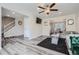 Open-concept living room with updated flooring, neutral paint, and abundant natural light at 3370 Flagstone Trce, Ellenwood, GA 30294