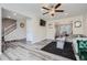 Spacious living room with modern flooring, neutral paint, and an open concept design at 3370 Flagstone Trce, Ellenwood, GA 30294