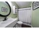 Bathroom featuring a white vanity and shower/tub combination at 4312 Daniel Dr, Winston, GA 30187