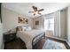 Cozy bedroom with ceiling fan, hardwood floors, and natural light at 4312 Daniel Dr, Winston, GA 30187