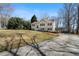 View of a home with a long driveway and large front lawn at 4312 Daniel Dr, Winston, GA 30187