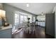 Bright eat-in kitchen with stainless steel appliances and dark hardwood floors at 4312 Daniel Dr, Winston, GA 30187