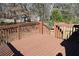Wood deck with railing and space for outdoor seating and enjoyment at 59 Pine Ridge Ln, White, GA 30184