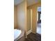 Bright bathroom featuring a soaking tub and a step-in shower with a sliding door at 59 Pine Ridge Ln, White, GA 30184