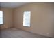 Cozy bedroom featuring neutral carpet and bright natural light at 59 Pine Ridge Ln, White, GA 30184