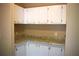 Bright kitchen with granite countertops and white cabinets at 59 Pine Ridge Ln, White, GA 30184