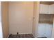 Functional laundry room with white cabinets and countertop, plus space for washer/dryer at 59 Pine Ridge Ln, White, GA 30184