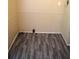 Functional laundry room with laminate flooring and simple design at 59 Pine Ridge Ln, White, GA 30184
