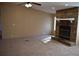View of the spacious living room with a stone fireplace and neutral carpet at 59 Pine Ridge Ln, White, GA 30184