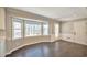 Breakfast nook features hardwood floors, a bay window, and a door to the exterior of the home at 1095 Willow Bnd, Roswell, GA 30075