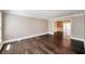 Bright living room features hardwood floors, crown molding, and neutral walls, creating a cozy and inviting atmosphere at 1095 Willow Bnd, Roswell, GA 30075