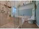 Well-designed bathroom featuring a glass-enclosed shower and modern fixtures at 1527 Ridgewood Sw Dr, Lilburn, GA 30047