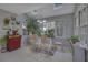 Eat-in dining area with lots of natural light coming from skylights and oversized windows at 1527 Ridgewood Sw Dr, Lilburn, GA 30047