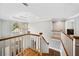 Foyer with hardwood floors, high ceilings, chandelier and large window over front door at 1904 Rosewood Ln, Woodstock, GA 30189