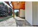 Cozy covered patio with a stone floor and wood ceiling provides a relaxing outdoor area with views of the yard at 3535 Southmont Ct, Cumming, GA 30041