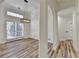 Elegant dining room featuring modern chandelier, hardwood floors, and natural light at 3535 Southmont Ct, Cumming, GA 30041