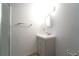 A bright bathroom with a modern vanity and walk-in shower at 610 Walnut Sw Pl, Marietta, GA 30060