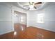 Inviting dining room with hardwood floors, modern molding, and an abundance of natural light at 610 Walnut Sw Pl, Marietta, GA 30060