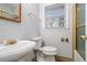 Charming bathroom with vintage-inspired fixtures and a separate shower area at 334 Nancy Sw Ct, Lilburn, GA 30047