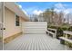 A deck featuring benches and a barrier to create a relaxing outdoor space at 334 Nancy Sw Ct, Lilburn, GA 30047