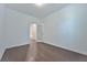 A spacious bedroom with hardwood floors and neutral walls at 3928 Hester St, Duluth, GA 30097