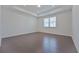 Bright bedroom featuring a trey ceiling, recessed lighting, and large window for natural light at 3928 Hester St, Duluth, GA 30097