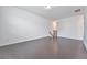 Large empty bonus room with hardwood floors and neutral paint at 3928 Hester St, Duluth, GA 30097