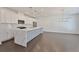 Open kitchen featuring a large island with quartz countertops, stainless steel appliances, and pendant lighting at 3928 Hester St, Duluth, GA 30097