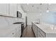 Kitchen featuring stainless steel appliances, a large island, and ample counter space, perfect for cooking at 3928 Hester St, Duluth, GA 30097