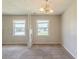 Bright dining area with large windows and neutral tones, great for gatherings at 6050 Randy Ln, Ellenwood, GA 30294