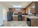 Functional kitchen featuring classic cabinets and ample counter space at 6050 Randy Ln, Ellenwood, GA 30294