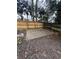 Fenced backyard with concrete pad, ideal for outdoor seating or a small storage shed at 1672 Cedar Bluff Way, Marietta, GA 30062