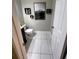 Bathroom features marble tile flooring, grey walls and modern decor at 1672 Cedar Bluff Way, Marietta, GA 30062