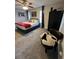 Well-lit bedroom with a ceiling fan, comfortable bed, and unique chair at 1672 Cedar Bluff Way, Marietta, GA 30062